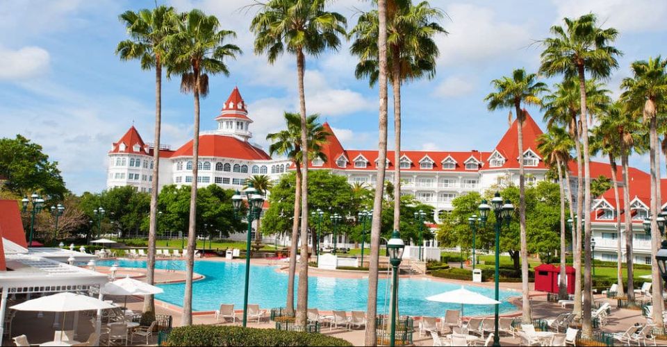View of the back of Disney Grand Floridian over the large pool area 960