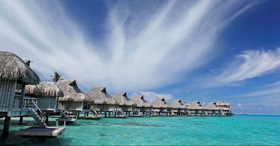 View of a row of Overwater Bungalows at the Conrad Hilton Bora Bora Nui Resort 960