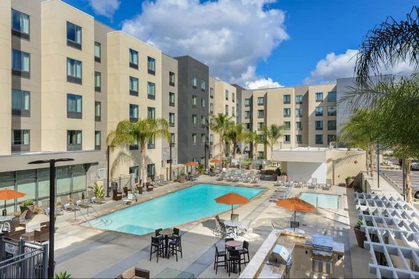 View of the Outdoor Heated Pool and Hotel at the Homewood Suites Anaheim Convention Center 600