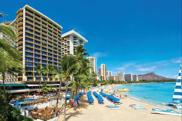 View of the Outrigger Beach Resort from Waikiki Beach looking across the sand 600