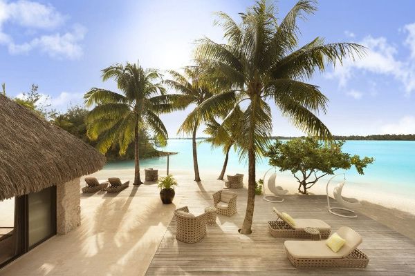 View of a private beach area in front of a bungalow at the St Regis Resort Bora Bora 600