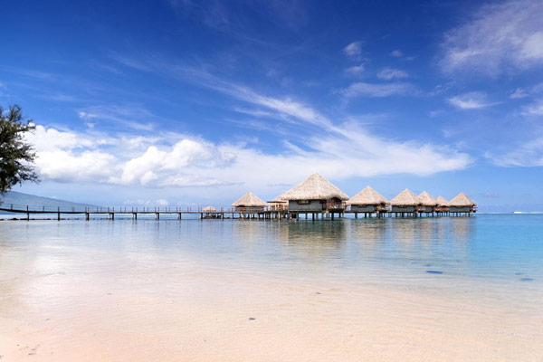 Bungalows over the water at the Le Meridien Tahiti Hotel from the beach 600