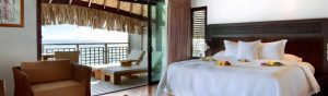 View of a luxury bungalow at hilton in Moorea Bedroom overlooking the lagoon 1200