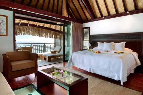 View of a luxury bungalow at hilton in Moorea Bedroom overlooking the lagoon 600