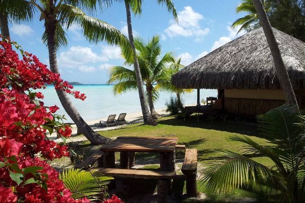 View of a Bungalow overlooking the beach at the Eden Beach Hotel in Bora Bora 600