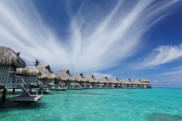 View of a row of Overwater Bungalows at the Conrad Hilton Bora Bora Nui Resort 600