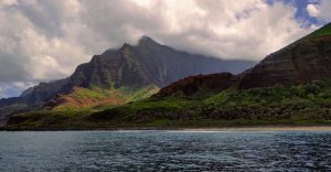 View of the Coast of Hawaiian Islands from the Water with a huge Mountain Backdrop 960