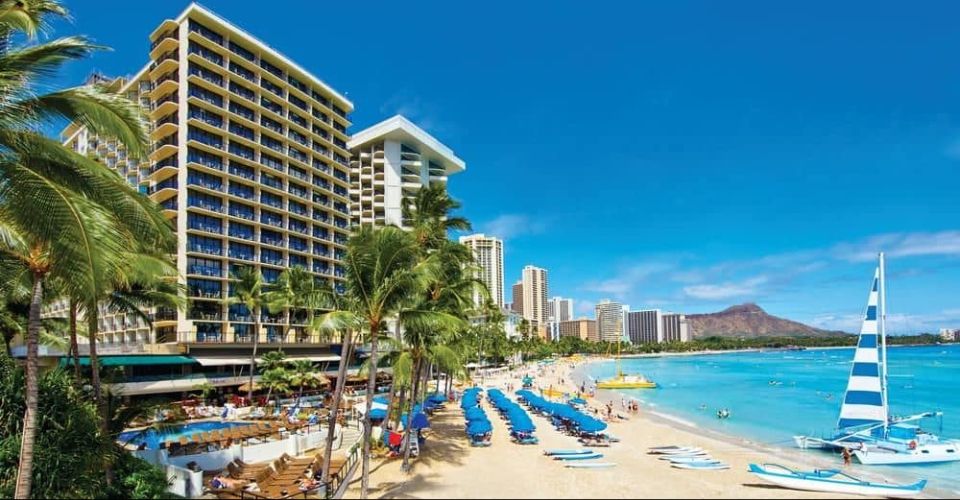 View of the Outrigger Beach Resort from Waikiki Beach looking across the sand 960